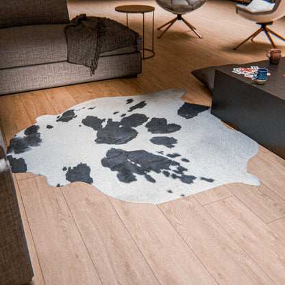 Oval Black & White Cowhide Rug #A006 by Hide Hoof