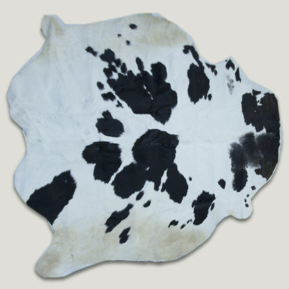 Oval Black & White Cowhide Rug #A006 by Hide Hoof